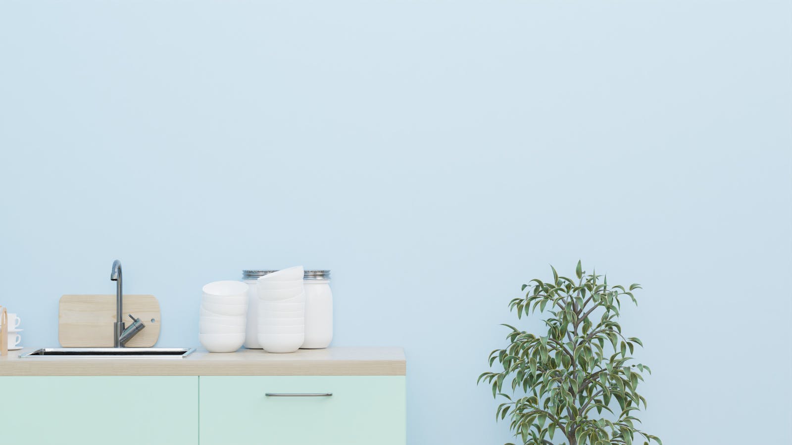 Cuisine avec mur et meubles bleu menthe pour une teinte fraiche